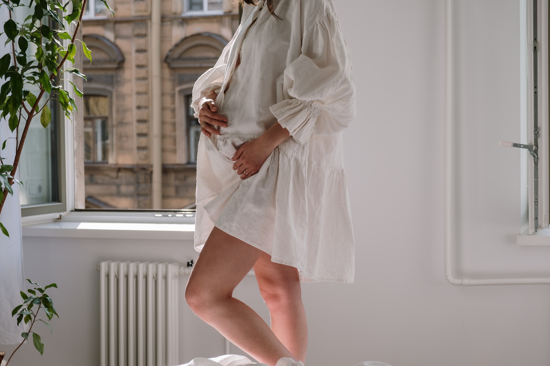 Pregnant lady in white dress